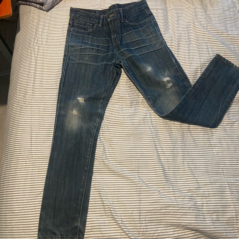 27- Levi’s- Destructed Tapered Jeans